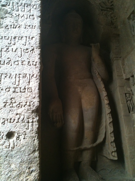 Inscriptions on the walls of the caves & the Standing Buddha